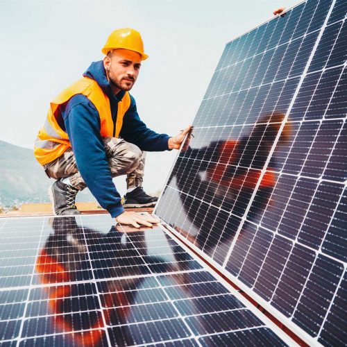 workers-assemble-energy-system-with-solar-panel-fo-2022-04-13-23-08-36-utc